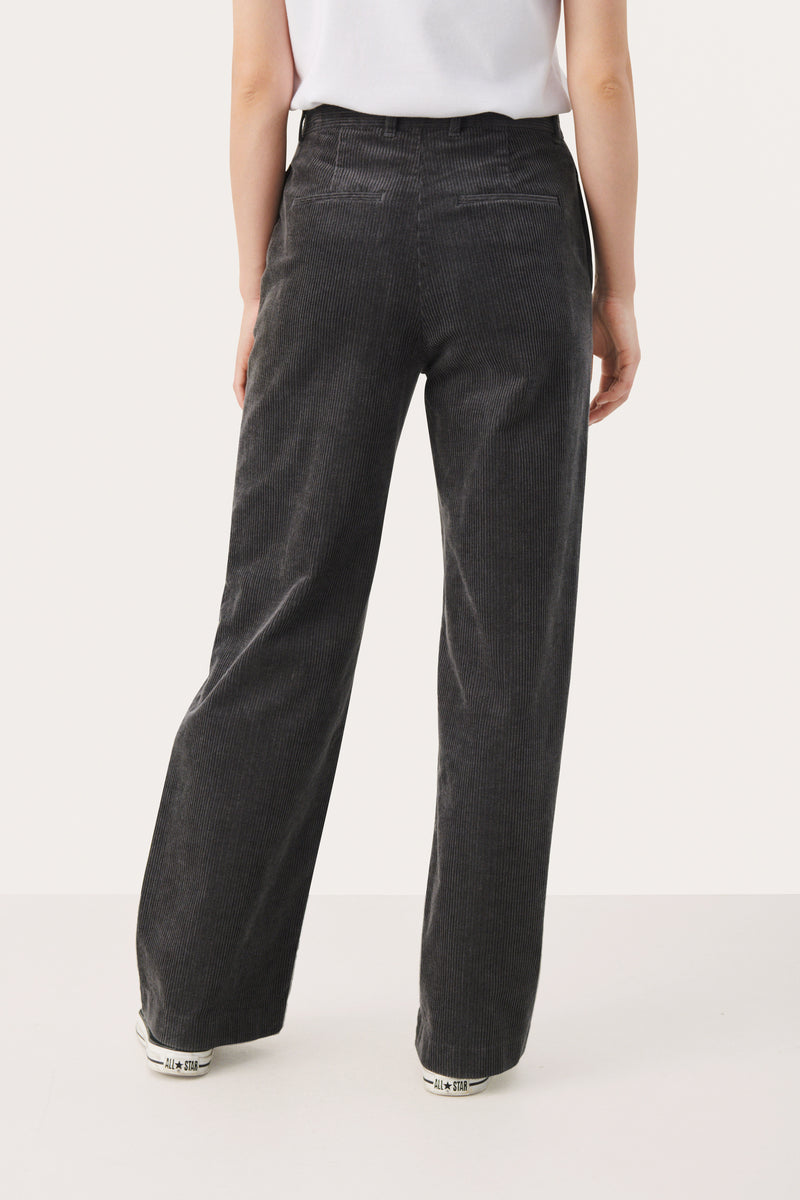 grey corduroy trousers