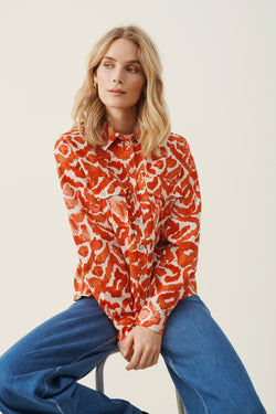 Camisha orange patterened blouse