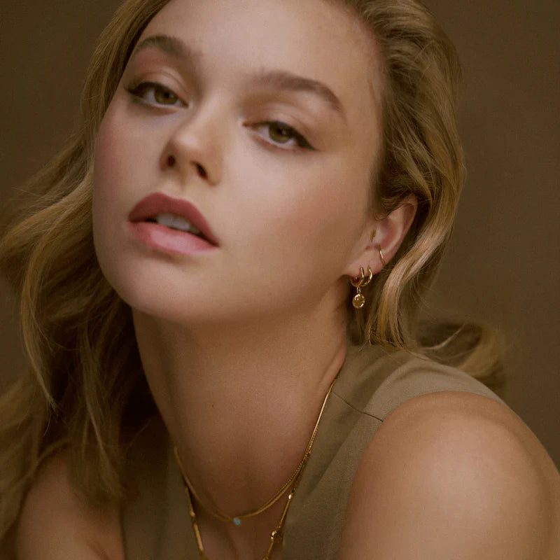 Orelia Gold Molten Coin Huggie Hoop Earrings